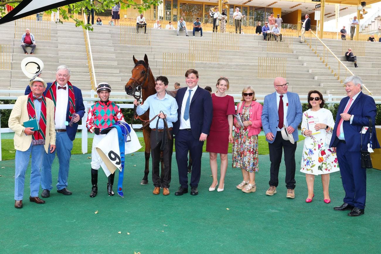 Owners with Gavin Hernon and a winner at Paris Longchamp